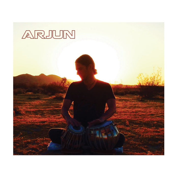 A person sits cross-legged outdoors at sunset, playing tabla drums in silhouette as the sun sets behind them. Arjun Bruggeman appears in bold red letters at the top left corner, evoking acceptance and evening listening.