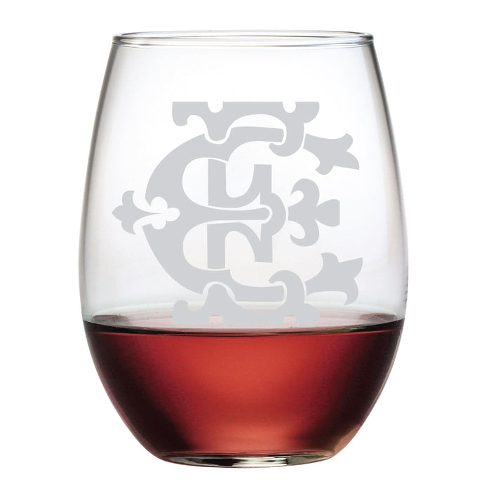 The 1-Letter Etched Initial Stemless Wine Glass features a monogram-style letter C in light gray on its surface, elegantly filled with rich red wine. It combines style and functionality, making it an ideal personalized gift.
