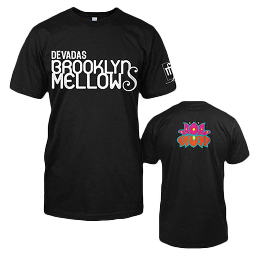 Black Devadas t-shirt with “Devadas Brooklyn Mellows” in bold white print on the front, a colorful lotus flower graphic on the upper back, and a small white logo on the left sleeve.