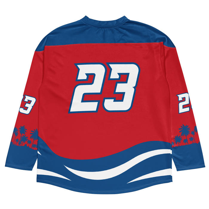 Red and blue floorball jersey featuring the number 23 and a tropical palm tree design on the sleeves.