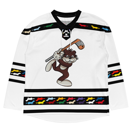 White floorball jersey featuring a cartoon character holding a stick, with colorful dog silhouettes along the hem.