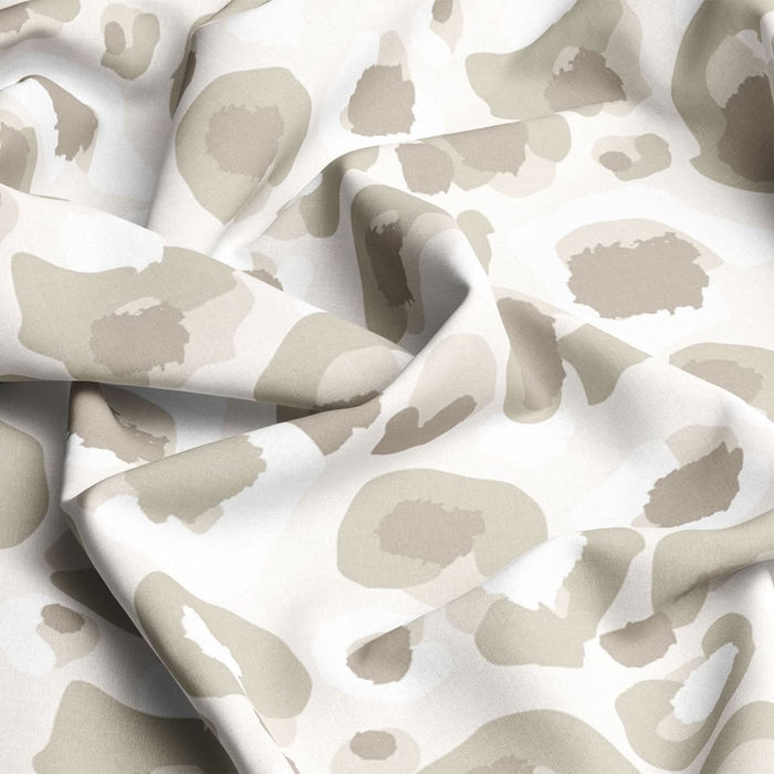 Neutral Cheetah fabric by the yard made from a crinkled cotton linen blend, featuring an elegant beige and white abstract camo-like pattern.
