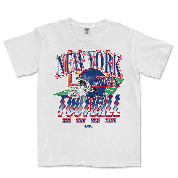 White vintage Comfort Colors® t-shirt featuring a colorful graphic design of a football helmet, "New York Football" text, and Roman numerals.