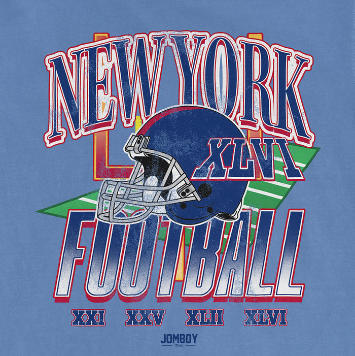 Vintage Comfort Colors T-shirt featuring a New York Giants football helmet, colorful "NEW YORK FOOTBALL" text, and Roman numerals.