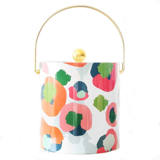 The Spot Cheetah Multi ice bucket is vibrant with colorful abstract patterns in pink, orange, green, and blue. It features a gold handle and lid knob on a white background with subtle cheetah spots for an elegant touch.