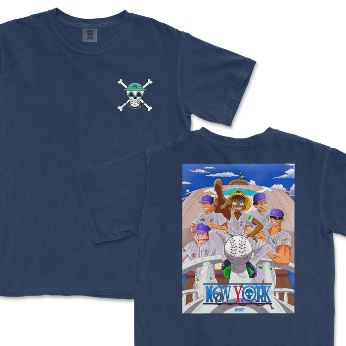 Navy Comfort Colors T-shirt featuring a cartoon baseball team with a skull and crossbones logo, "New York" text, and vibrant graphics.