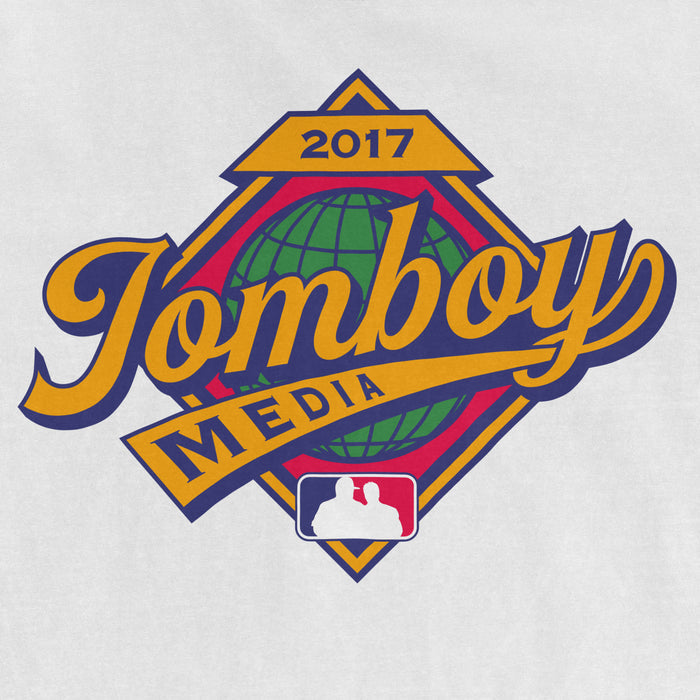 Comfort Colors T-shirt featuring the "Jomboy Media" logo with a globe, "2017" and a silhouette of two people.