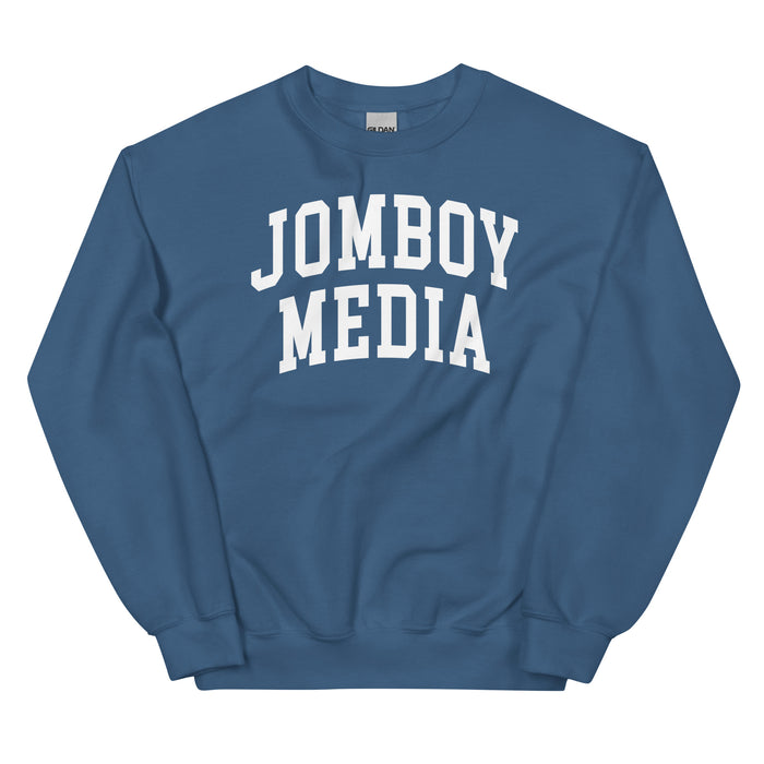 Blue sweatshirt with "JOMBOY MEDIA" printed in bold white letters across the front.