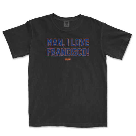 Black Comfort Colors T-shirt with bold blue and orange text that reads "MAN, I LOVE FRANCISCO!" and a small "JOMBOY" logo below.