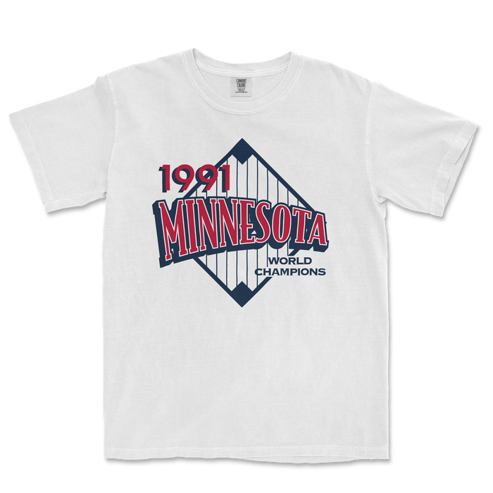 White Comfort Colors T-shirt featuring a vintage Minnesota 1991 World Champions graphic with a baseball diamond design.