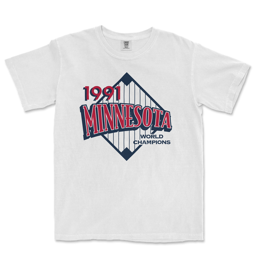 White Comfort Colors T-shirt featuring a vintage Minnesota 1991 World Champions graphic with a baseball diamond design.