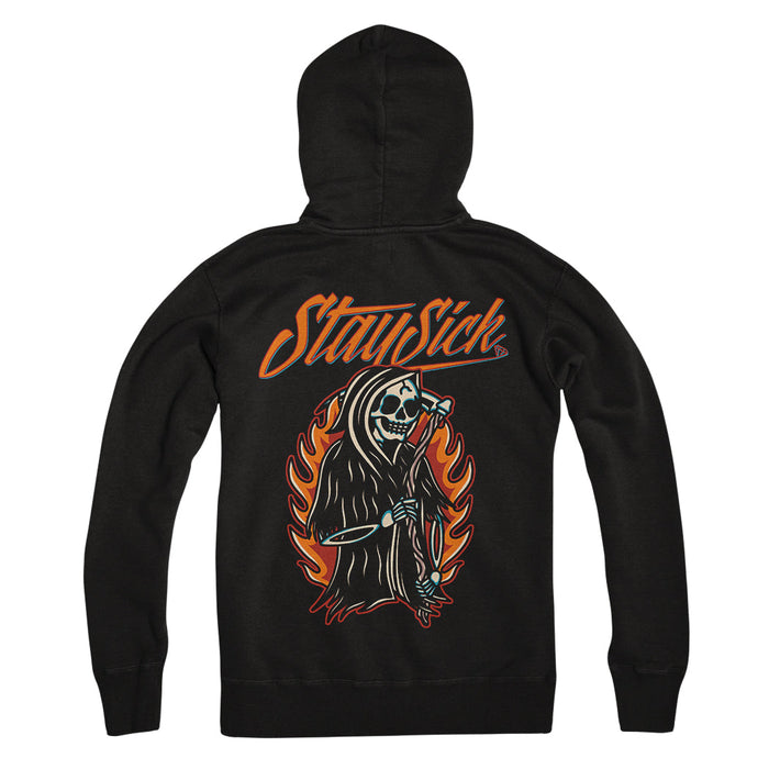 Stay Sick Clothing Black Pullover Reaper Hoodie with Stay Sick text on the back, showcasing a grim reaper wielding a scythe and surrounded by orange flames for a bold Reaper On Fire style.