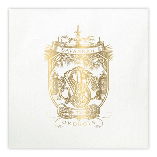 The Savannah Crest Cocktail Napkin Set in white and gold boasts intricate designs with a gold foil ornate crest on faux linen, elegantly displaying Savannah at the top and Georgia below. It features a monogram, fountain illustration, and marks the year 1733.