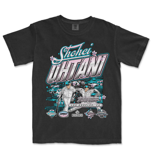 Black T-shirt featuring pastel-colored graphic design of Shohei Ohtani, with cherry blossoms, Japanese characters, and Los Angeles, CA text.
