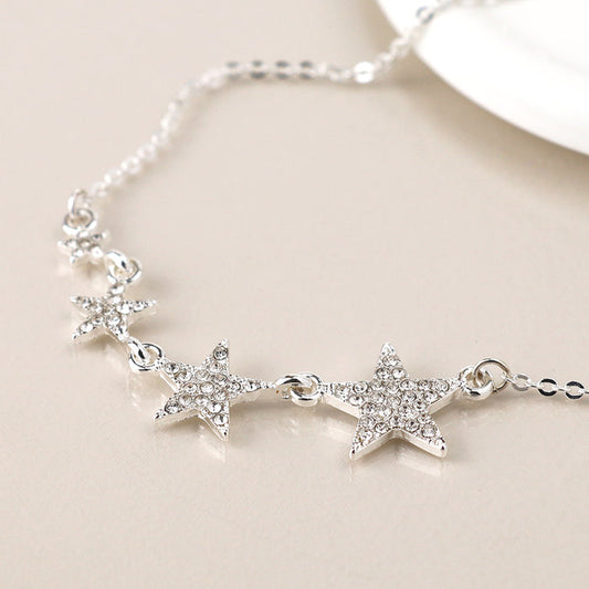 Silver Plated Graduated Crystal Star Necklace