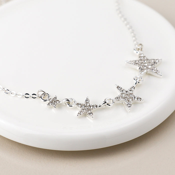 Silver Plated Graduated Crystal Star Necklace