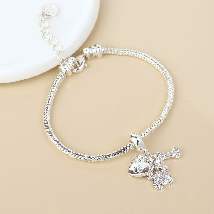 Silver Plated Slider Charm Bracelet with Crystal Heart and Paws Charm Mix
