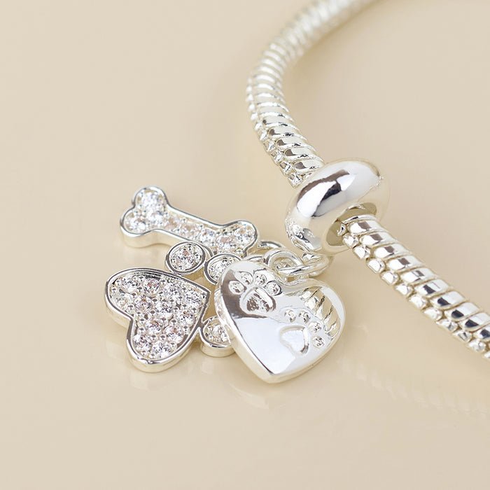 Silver Plated Slider Charm Bracelet with Crystal Heart and Paws Charm Mix