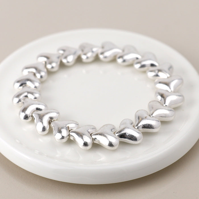 Silver Plated Worn Hearts Stretch Bracelet