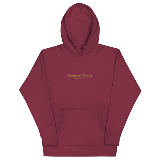 Maroon embroidered hoodie with "Jomboy Media, New York, NY" logo on the front, featuring a front pocket and drawstring hood.