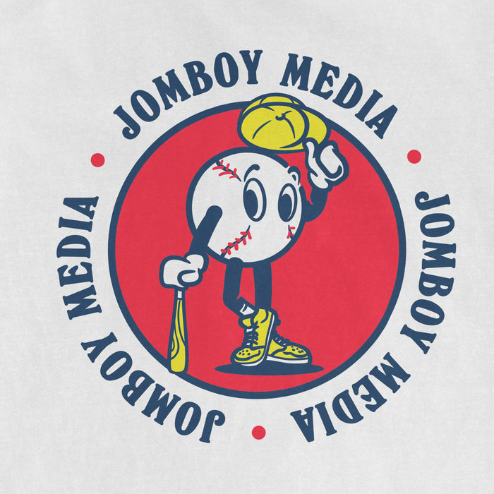 A cartoon baseball mascot with a bat, wearing sneakers, holding a yellow baseball glove, surrounded by the text "JOMBOY MEDIA" and "MEDIJA" in a circular design.