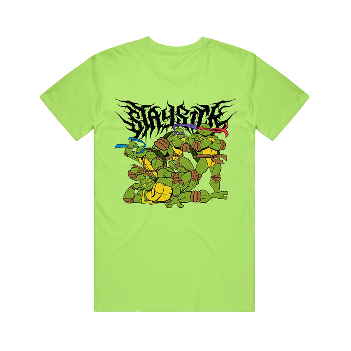 A lime t-shirt from Stay Sick Clothing features the Teenage Mutant Ninja Turtles in action poses with a bold, jagged black TMNT logo above.