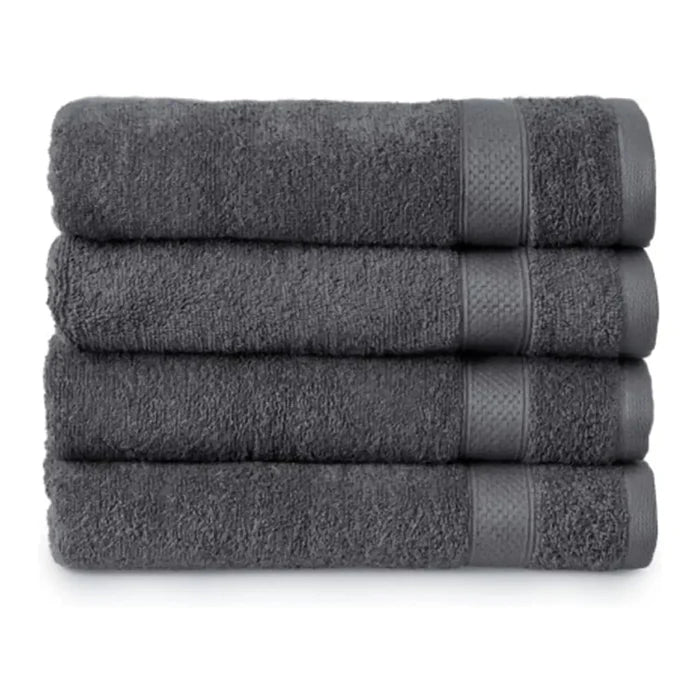 Set of 4 charcoal dark grey bath towels folded in a pile