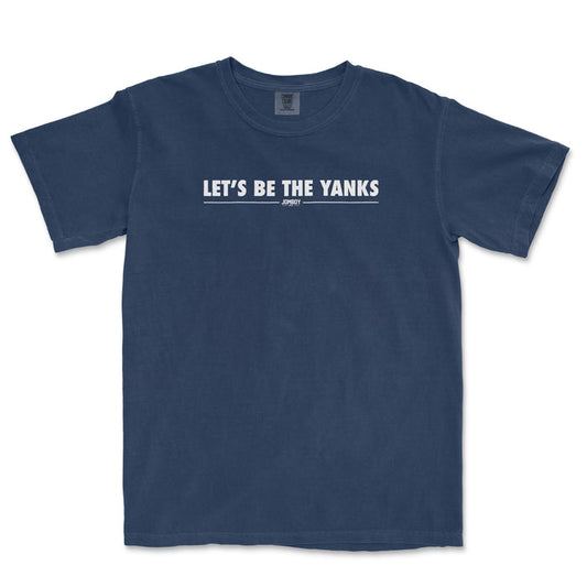 Blue T-shirt with white text that reads "LET'S BE THE YANKS" and "JOMBOY" underneath, casual style, front view.