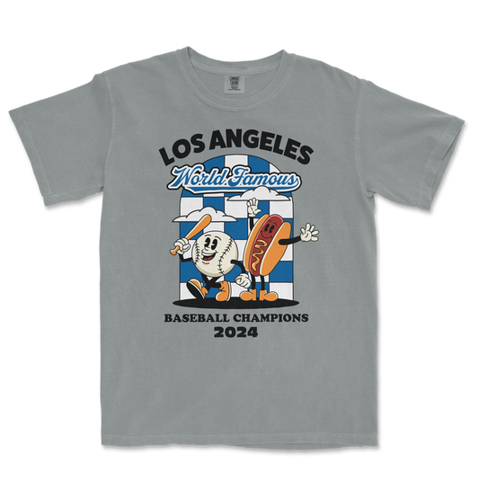 Gray T-shirt featuring cartoon baseball and hot dog characters celebrating 2024 World Famous Baseball Champions in Los Angeles.